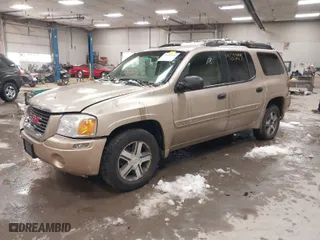2004 GMC Envoy XL SLT with VIN 1GKET16S746148679, listed as a IAAI auction lot 41602991 with 196621 miles. Bid and sale history available at carsss.com. Image 2.