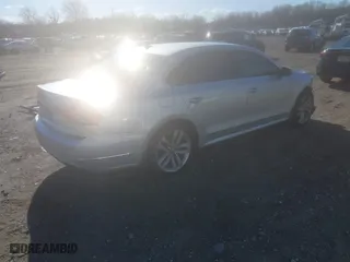 2016 Volkswagen Passat 1.8T SEL with VIN 1VWCT7A35GC011006, listed as a IAAI auction lot 41039744 with 123,422 mi miles. Bid and sale history available at carsss.com. Image 4.