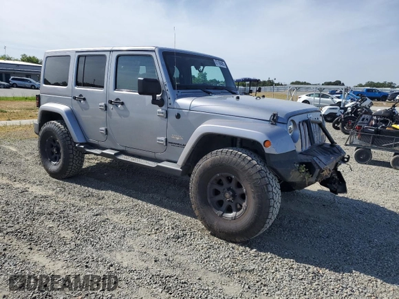 2014 Jeep Wrangler Unlimited Sahara with VIN 1C4HJWEG1EL126611, listed as a Copart auction lot 57169485 with 122,000 mi miles and Salvage title. Bid and sale history available at DreamBid. Image 4.