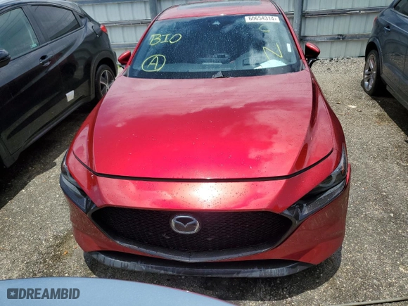 2019 Mazda Mazda3 Hatchback w/Premium Pkg with VIN JM1BPANM6K1139780, listed as a Copart auction lot 60654314 with 34,173 mi miles and Non Repairable. Bid and sale history available at carsss.com. Image 5.