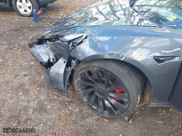 2022 Tesla Model 3 Performance with VIN 5YJ3E1EC5NF270082, listed as a IAAI auction lot 40930688 with 1 mi miles. Bid and sale history available at carsss.com. Image 6.