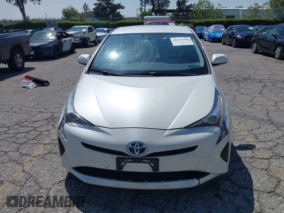 2016 Toyota Prius Four with VIN JTDKARFUXG3511034, listed as a IAAI auction lot 42137394 with 77,424 mi miles. Bid and sale history available at carsss.com. Image 12.