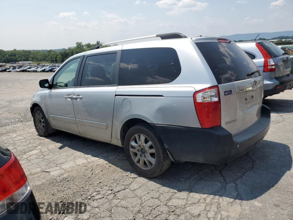 2009 Kia Sedona LX with VIN KNDMB233096296810, listed as a Copart auction lot 64614694 with 231,572 mi miles and Salvage Title. Bid and sale history available at carsss.com. Image 2.