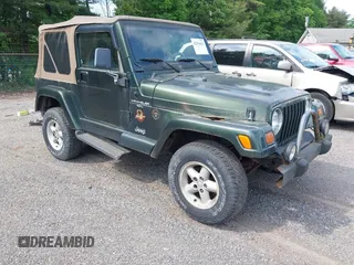 1998 Jeep Wrangler Sahara z VIN 1J4FY49SXWP716218, wystawiony jako IAAI lot #42354433 z przebiegiem 234 378 mil mil oraz . Historia ofert i sprzedaży dostępna na DreamBid. Obrazek 1.