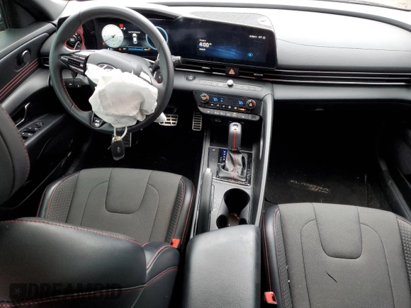 2023 Hyundai Elantra N Line z VIN KMHLR4AF9PU498016, wystawiony jako Copart lot #52012365 z przebiegiem 20 521 mil mil oraz Szkoda całkowita • Salvage title. Historia ofert i sprzedaży dostępna na DreamBid. Obrazek 8.