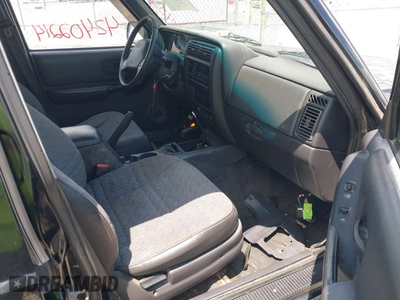 1999 Jeep Cherokee Sport with VIN 1J4FF68S0XL509171, listed as a IAAI auction lot 42402214 with Not provided miles and . Bid and sale history available at DreamBid. Image 5.