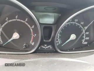 2016 Ford Fiesta SE z VIN 3FADP4EJ4GM155525, wystawiony jako Copart lot #59173285 z przebiegiem Nie podano mil oraz Szkody całkowita. Historia ofert i sprzedaży dostępna na DreamBid. Obrazek 9.