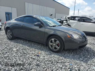 2007 Pontiac G6 GT with VIN 1G2ZH18NX74127920, listed as a Copart auction lot 52950365 with 127,428 mi miles and Salvage title. Bid and sale history available at DreamBid. Image 4.