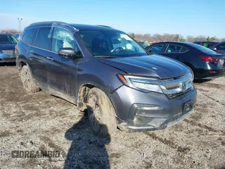 2021 Honda Pilot Elite with VIN 5FNYF6H09MB032350, listed as a IAAI auction lot 41514472 with 45,008 mi miles. Bid and sale history available at carsss.com. Image 1.