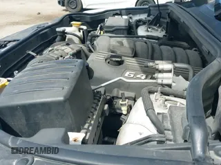 2015 Jeep Grand Cherokee SRT z VIN 1C4RJFDJ5FC647995, wystawiony jako IAAI lot #42276301 z przebiegiem 141 332 mil mil oraz . Historia ofert i sprzedaży dostępna na DreamBid. Obrazek 19.