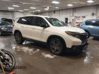 2020 Honda Passport EX-L with VIN 5FNYF8H57LB021112, listed as a IAAI auction lot 41547454 with 137,209 mi miles and . Bid and sale history available at DreamBid. Image 1.