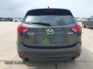 2016 Mazda CX-5 Sport with VIN JM3KE4BY8G0921243, listed as a IAAI auction lot 42102663 with 111,960 mi miles and . Bid and sale history available at DreamBid. Image 16.