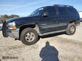 2001 Chevrolet Tahoe LT with VIN 1GNEC13T31R145370, listed as a Copart auction lot 88286985 with 258,894 mi miles and Salvage Title. Bid and sale history available at carsss.com. Image 1.