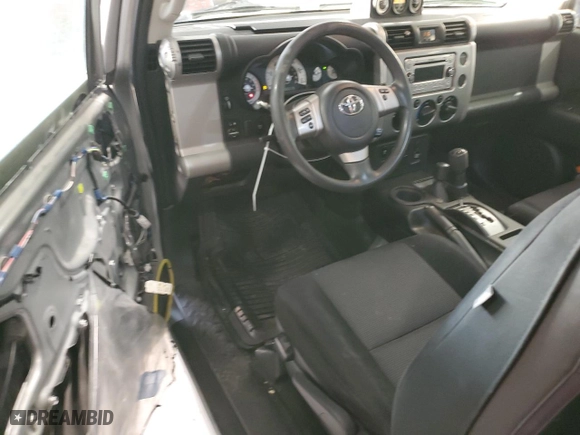 2012 Toyota FJ Cruiser with VIN JTEBU4BF9CK129302, listed as a Copart auction lot 84932364 with 127,851 mi miles and Salvage Title. Bid and sale history available at carsss.com. Image 8.