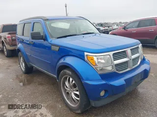 2008 Dodge Nitro SLT with VIN 1D8GU58K58W177983, listed as a IAAI auction lot 41447138 with 184,004 mi miles. Bid and sale history available at carsss.com. Image 1.