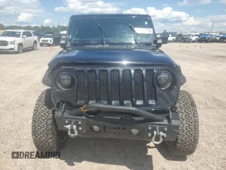 2021 Jeep Wrangler Unlimited Willys with VIN 1C4HJXDN0MW859686, listed as a Copart auction lot 56657725 with 49,984 mi miles and Salvage title. Bid and sale history available at DreamBid. Image 5.