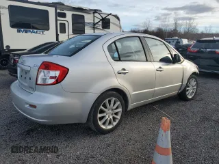 2011 Suzuki SX4 LE with VIN JS2YC5A23B6300189, listed as a Copart auction lot 85389574 with 71,272 mi miles and Clean Title. Bid and sale history available at carsss.com. Image 3.