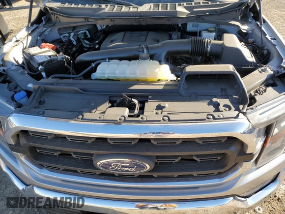 2023 Ford F-150 XL with VIN 1FTFW1E81PKG15779, listed as a Copart auction lot 46870415 with 15,691 mi miles and Salvage Title. Bid and sale history available at carsss.com. Image 11.