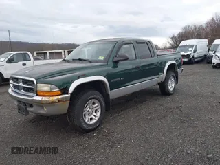 2001 Dodge Dakota Sport with VIN 1B7HG2AN91S279538, listed as a IAAI auction lot 41925891 with 113,368 mi miles and . Bid and sale history available at DreamBid. Image 2.