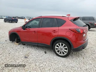 2014 Mazda CX-5 Grand Touring with VIN JM3KE2DY1E0332971, listed as a Copart auction lot 51235415 with 105,338 mi miles and Salvage Title. Bid and sale history available at carsss.com. Image 2.