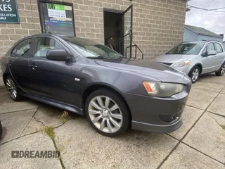 2010 Mitsubishi Lancer GTS z VIN JA32X8HWXAU021359, wystawiony jako Copart lot #61589765 z przebiegiem 105 998 mil mil oraz Czysty tytuł • Clean title. Historia ofert i sprzedaży dostępna na DreamBid. Obrazek 1.