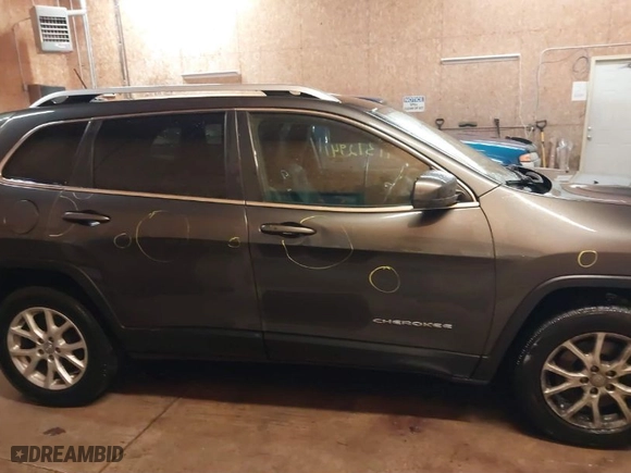 2014 Jeep Cherokee Latitude with VIN 1C4PJMCS7EW220059, listed as a IAAI auction lot 41312941 with 187,821 mi miles. Bid and sale history available at carsss.com. Image 13.