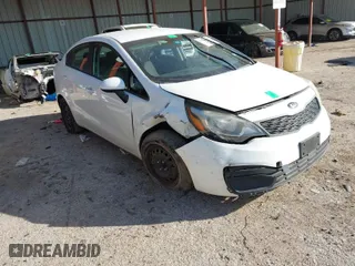 2015 Kia Rio LX with VIN KNADM4A30F6449543, listed as a IAAI auction lot 41583073 with 80,288 mi miles. Bid and sale history available at carsss.com. Image 1.