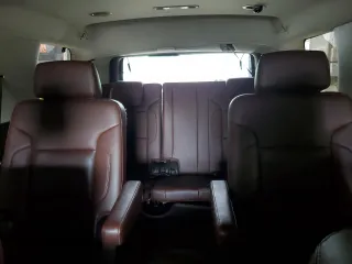 2015 Chevrolet Tahoe LTZ z VIN 1GNSKCKC4FR277564, wystawiony jako Copart lot #60589335 z przebiegiem Nie podano mil oraz Szkoda całkowita • Salvage title. Historia ofert i sprzedaży dostępna na DreamBid. Obrazek 10.