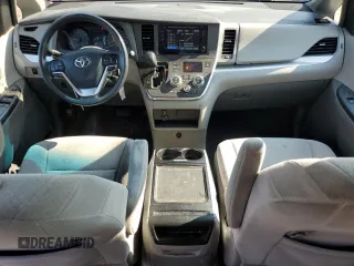 2015 Toyota Sienna LE AAS with VIN 5TDKK3DCXFS651621, listed as a Copart auction lot 66263885 with 150,578 mi miles and Salvage title. Bid and sale history available at DreamBid. Image 8.