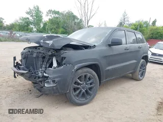 2020 Jeep Grand Cherokee Laredo E with VIN 1C4RJFAG2LC326761, listed as a IAAI auction lot 42434904 with 88,556 mi miles and . Bid and sale history available at DreamBid. Image 2.