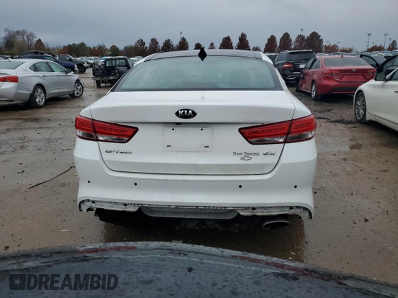 2016 Kia Optima EX with VIN 5XXGU4L31GG097296, listed as a Copart auction lot 74909523 with 79,450 mi miles and Salvage Title. Bid and sale history available at carsss.com. Image 6.