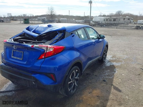 2022 Toyota C-HR XLE with VIN NMTKHMBX4NR141580, listed as a IAAI auction lot 41718394 with 27,294 mi miles. Bid and sale history available at carsss.com. Image 4.