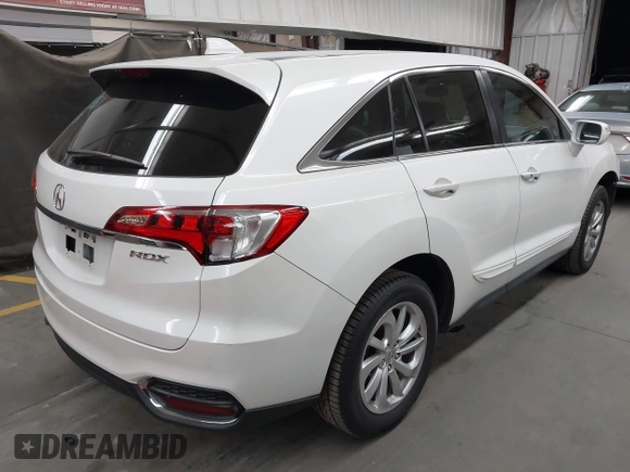 2018 Acura RDX with VIN 5J8TB3H38JL011983, listed as a IAAI auction lot 42385892 with 100,562 mi miles and . Bid and sale history available at DreamBid. Image 4.