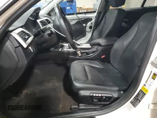 2013 BMW 3 Series 320i xDrive with VIN WBA3C3C5XDF982732, listed as a Copart auction lot 62852385 with 134,466 mi miles and Salvage title. Bid and sale history available at DreamBid. Image 7.