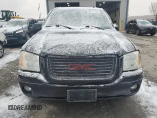 2006 GMC Envoy SLT with VIN 1GKDT13S562338202, listed as a Copart auction lot 87326504 with 158,468 mi miles and Clean Title. Bid and sale history available at carsss.com. Image 5.