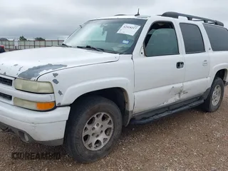 2003 Chevrolet Suburban LT z VIN 3GNFK16Z73G148346, wystawiony jako IAAI lot #42418217 z przebiegiem 355 139 mil mil oraz . Historia ofert i sprzedaży dostępna na DreamBid. Obrazek 6.