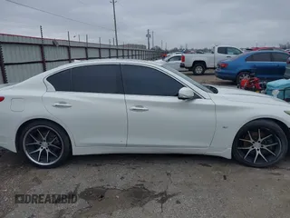 2014 Infiniti Q50 Sport with VIN JN1BV7AP1EM688494, listed as a IAAI auction lot 41622119 with 152,881 mi miles and . Bid and sale history available at DreamBid. Image 13.