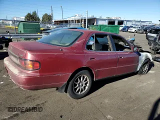 1993 Toyota Camry LE with VIN JT2SK12E8P0149731, listed as a Copart auction lot 83082154 with 197,590 mi miles and Salvage Title. Bid and sale history available at carsss.com. Image 3.