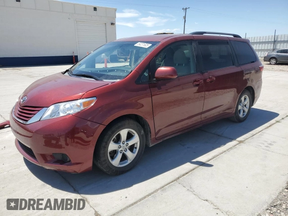 2015 Toyota Sienna LE AAS with VIN 5TDKK3DC2FS604910, listed as a Copart auction lot 59231605 with 118,974 mi miles and Salvage title. Bid and sale history available at DreamBid. Image 1.