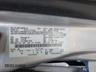 2013 Ford Focus SE with VIN 1FADP3F27DL308798, listed as a IAAI auction lot 41787683 with 158,581 mi miles. Bid and sale history available at carsss.com. Image 9.