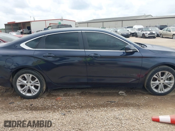 2014 Chevrolet Impala LT with VIN 2G1115SLXE9222573, listed as a IAAI auction lot 42119082 with 147,011 mi miles and . Bid and sale history available at DreamBid. Image 13.