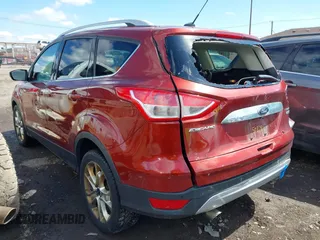 2015 Ford Escape Titanium with VIN 1FMCU0JX8FUA89049, listed as a IAAI auction lot 41988611 with 277,003 mi miles. Bid and sale history available at carsss.com. Image 3.