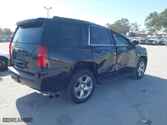 2018 Chevrolet Tahoe LT with VIN 1GNSCBKCXJR132867, listed as a IAAI auction lot 41456319 with 59,131 mi miles. Bid and sale history available at carsss.com. Image 4.