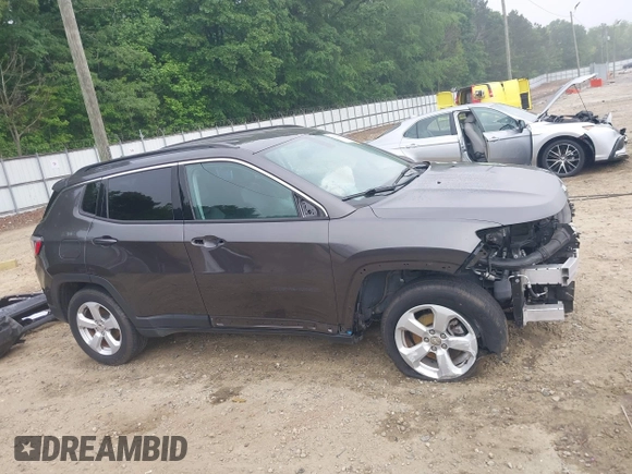 2019 Jeep Compass Latitude with VIN 3C4NJDBB8KT748588, listed as a IAAI auction lot 42224482 with 70,810 mi miles and . Bid and sale history available at DreamBid. Image 14.