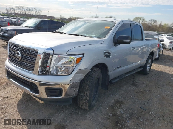 2017 Nissan Titan SV with VIN 1N6AA1EJ3HN538034, listed as a IAAI auction lot 41863785 with 204,198 mi miles and . Bid and sale history available at DreamBid. Image 2.