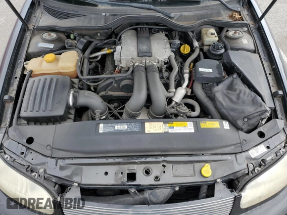 1997 Cadillac Catera z VIN W06VR52RXVR092016, wystawiony jako Copart lot #54067575 z przebiegiem 63 978 mil mil oraz Tytuł czysty. Historia ofert i sprzedaży dostępna na DreamBid. Obrazek 11.