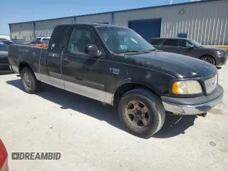 2000 Ford F-150 XL with VIN 1FTRX17L1YKA97900, listed as a Copart auction lot 48758555 with 220,834 mi miles and Clean Title. Bid and sale history available at carsss.com. Image 4.