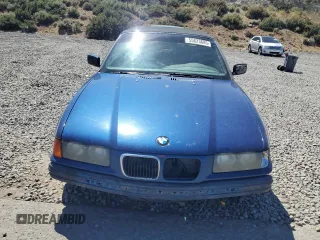 1998 BMW 3 Series 323i with VIN WBABJ8339WEM22707, listed as a Copart auction lot 55623685 with 130,704 mi miles and Salvage title. Bid and sale history available at DreamBid. Image 5.