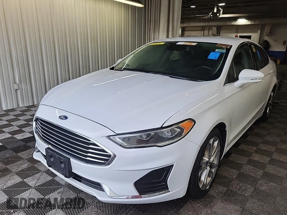 2020 Ford Fusion SEL with VIN 3FA6P0CD1LR154201, listed as a IAAI auction lot 42715761 with 99,448 mi miles and . Bid and sale history available at DreamBid. Image 28.
