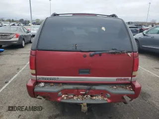 1999 GMC Jimmy SLE with VIN 1GKDT13W3X2546163, listed as a Copart auction lot 79842734 with 144,800 mi miles and Salvage Title. Bid and sale history available at carsss.com. Image 6.
